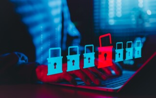 Cybersecurity,And,Data,Breach,Risk,Concept.,A,Person,Using,Laptop