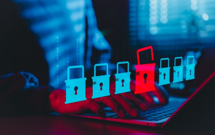 Cybersecurity,And,Data,Breach,Risk,Concept.,A,Person,Using,Laptop