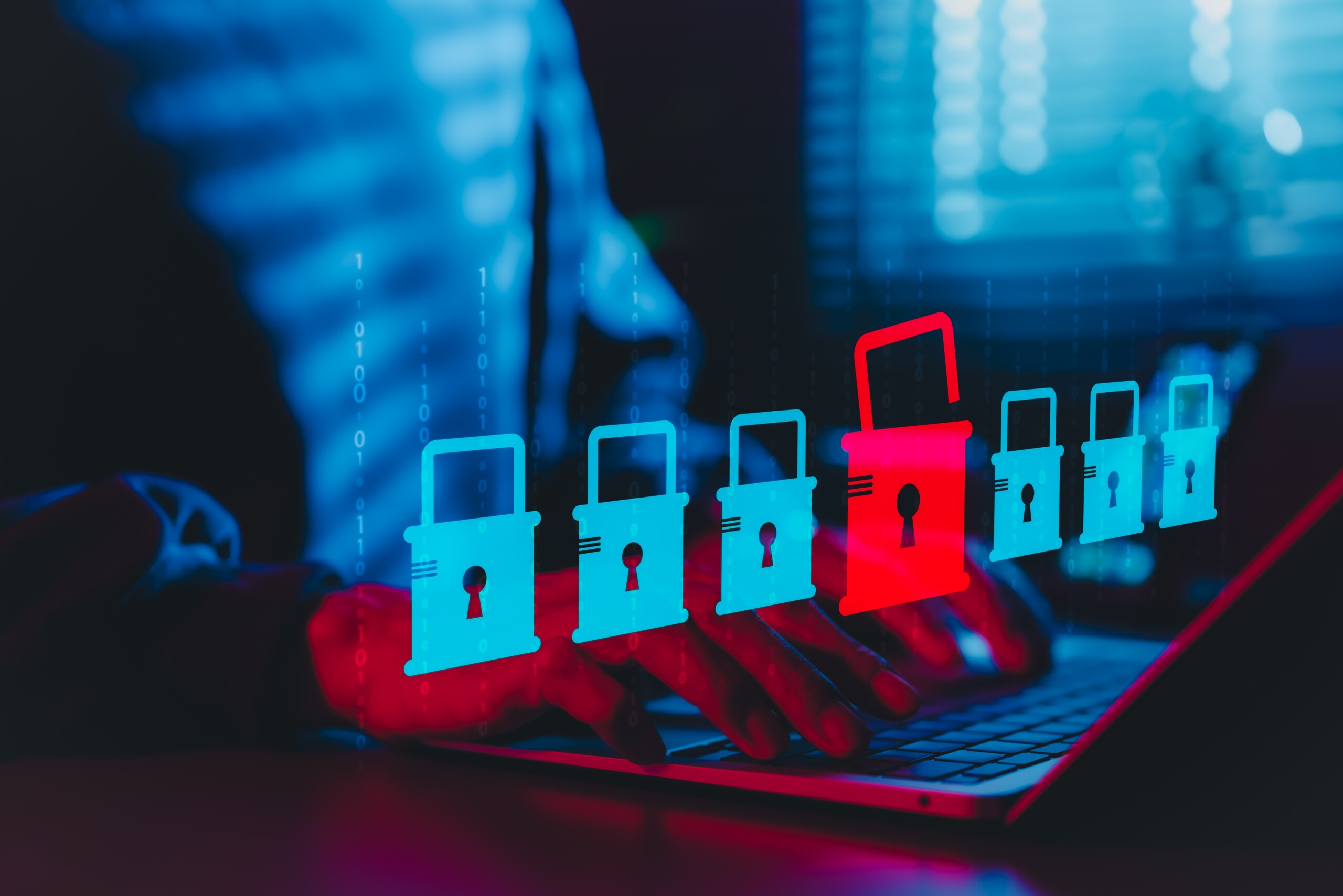 Cybersecurity,And,Data,Breach,Risk,Concept.,A,Person,Using,Laptop